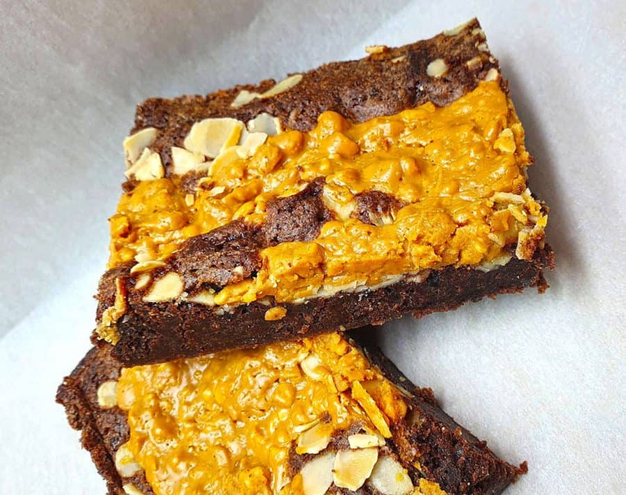 Picture of a Belgian chocolate brownie drizzled in caramel and sprinkled with peanuts, an all time favourite.